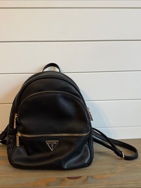 Guess | Manhattan II Black Faux Leather Backpack Purse with Shiny Gold Hardware